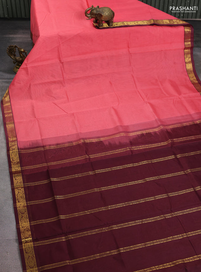 Silk cotton saree peach pink and deep maroon with plain body and zari woven border