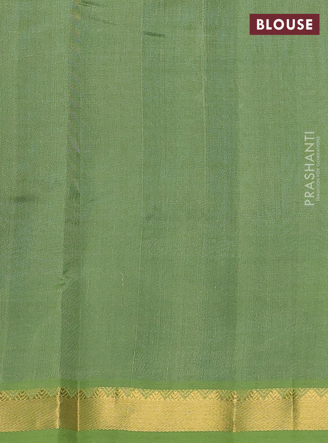 Silk cotton saree peacock blue and pastel green with plain body and zari woven border