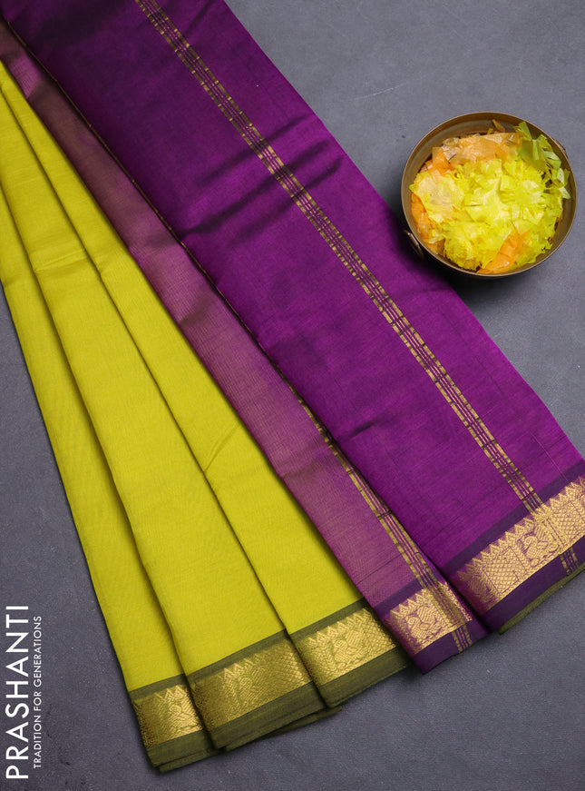 Silk cotton saree lime yellow and purple with plain body and zari woven border