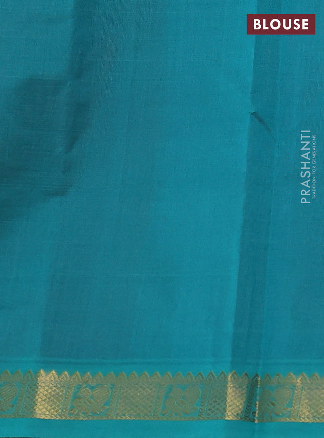 Silk cotton saree maroon and teal green with plain body and zari woven border