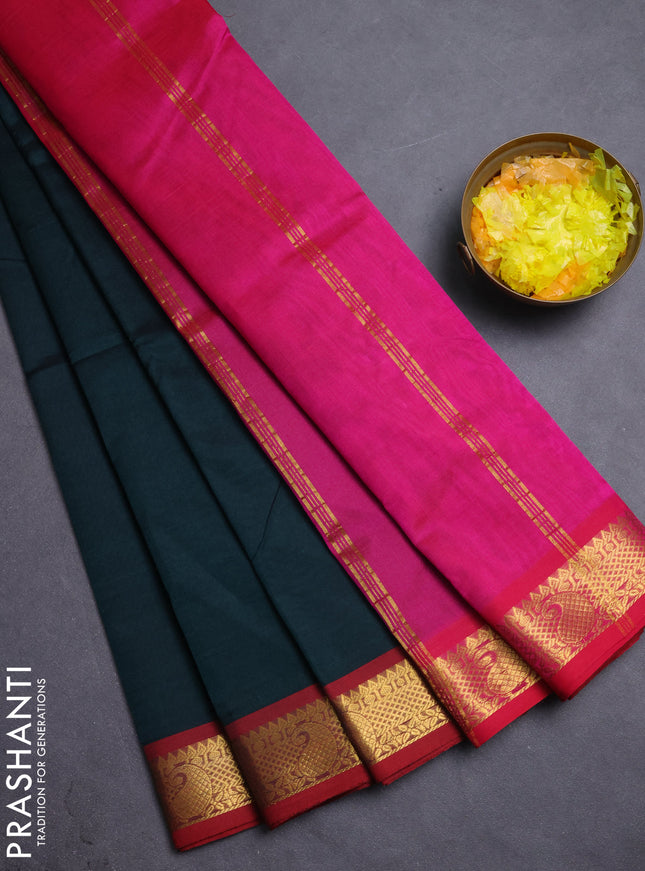 Silk cotton saree bottle green and pink with plain body and paisley zari woven border