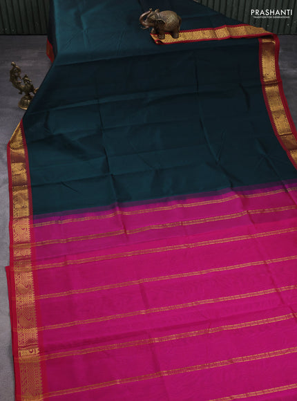 Silk cotton saree bottle green and pink with plain body and paisley zari woven border
