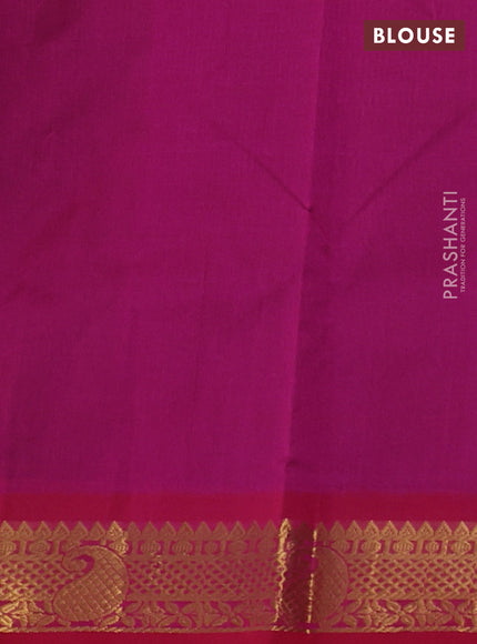 Silk cotton saree bottle green and pink with plain body and paisley zari woven border