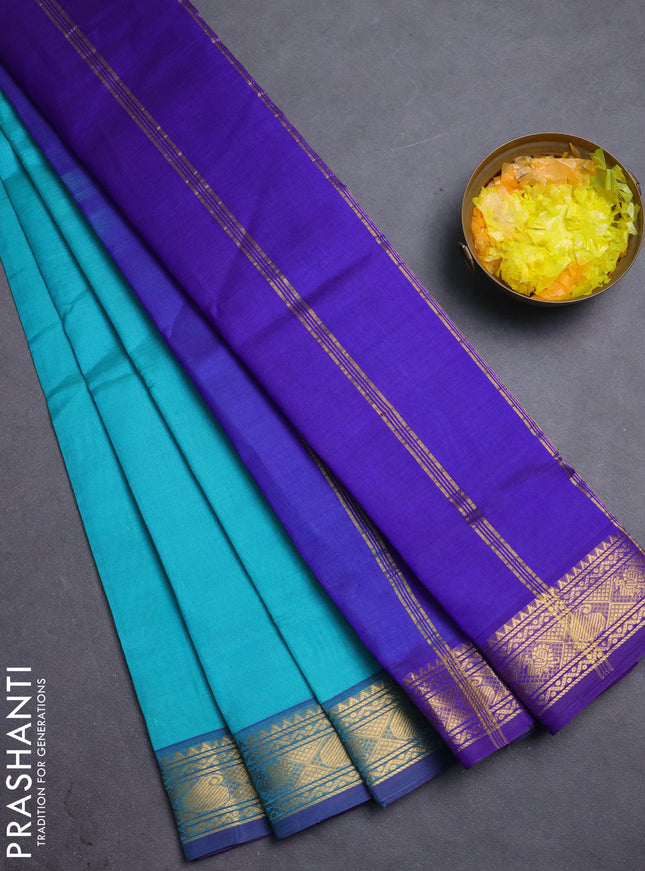Silk cotton saree teal blue and blue with plain body and zari woven border