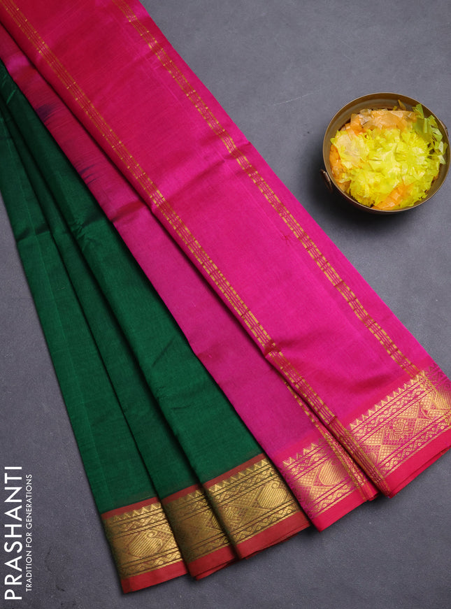 Silk cotton saree green and pink with plain body and zari woven border