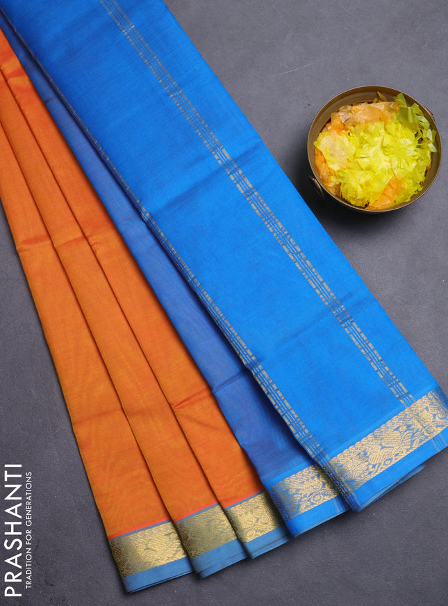 Silk cotton saree sunset orange and cs blue with plain body and annam zari woven border