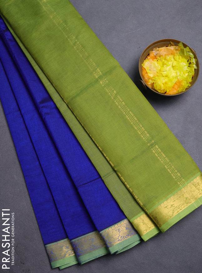 Silk cotton saree blue and light green with plain body and annam zari woven border
