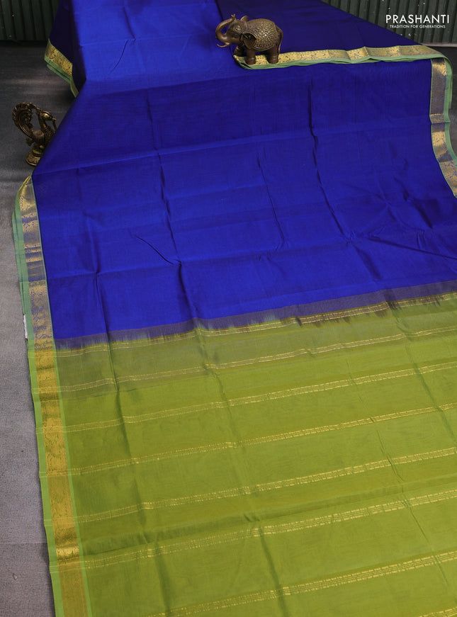 Silk cotton saree blue and light green with plain body and annam zari woven border