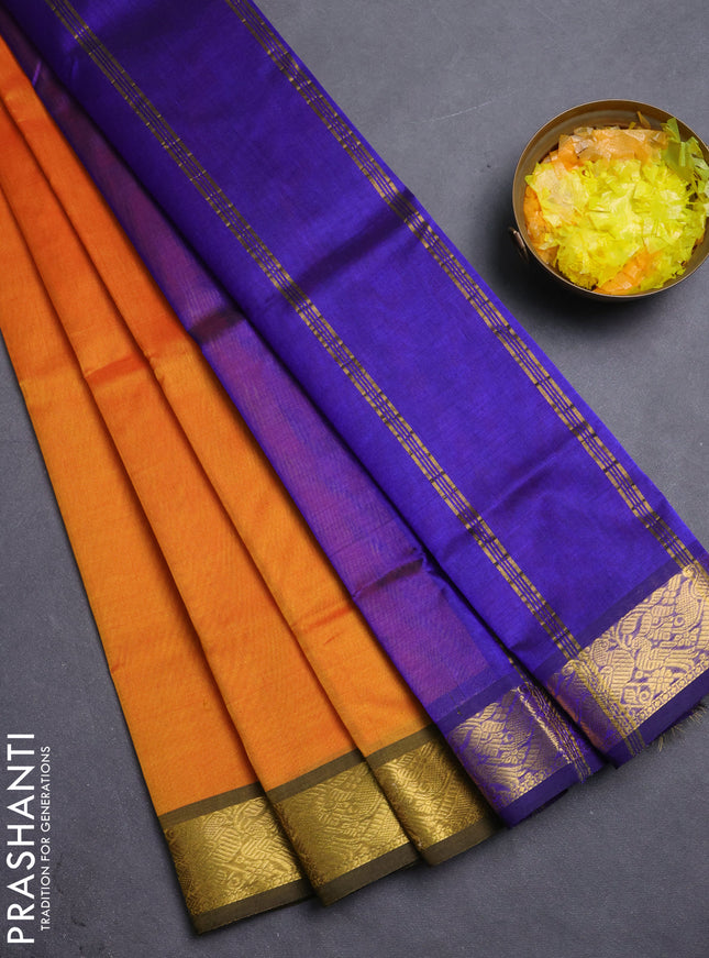 Silk cotton saree sunset orange and blue with plain body and peacock zari woven border
