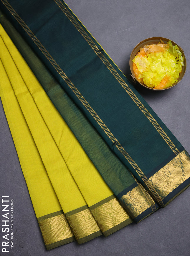 Silk cotton saree lime yellow and bottle green with plain body and annam & temple zari woven border