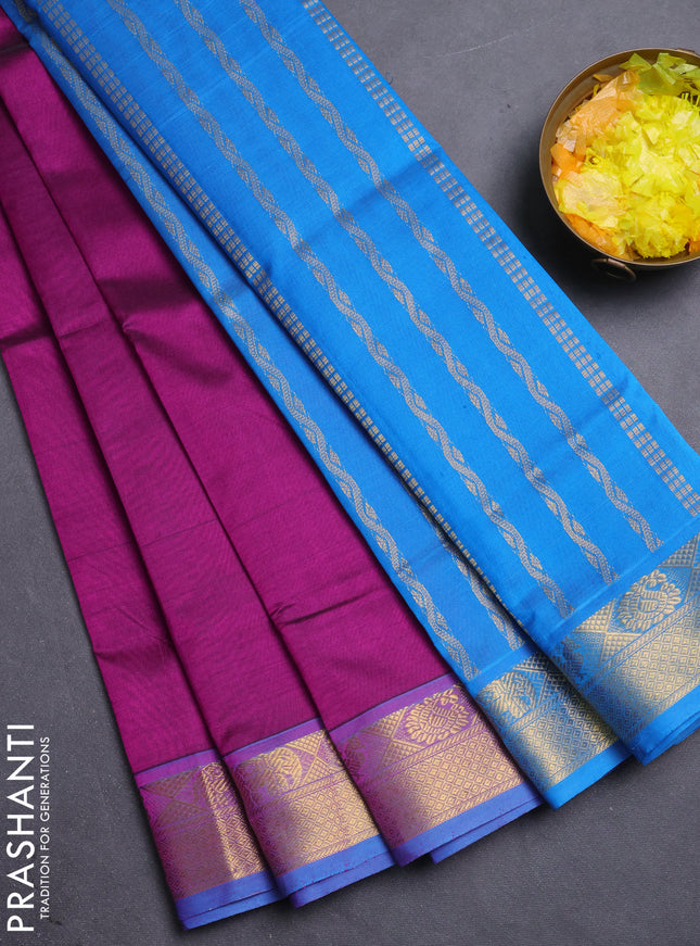 Silk cotton saree purple and cs blue with plain body and zari woven border