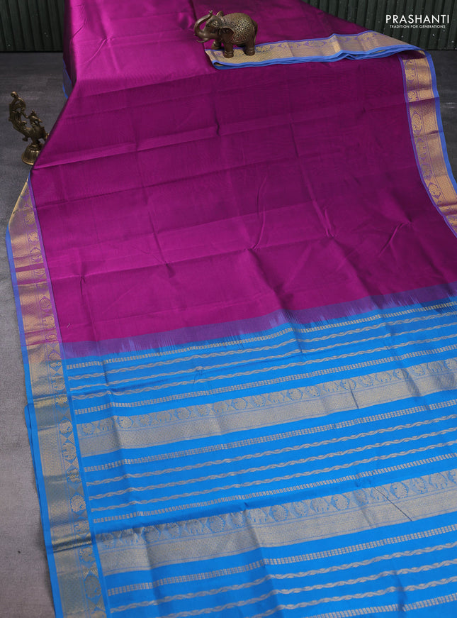 Silk cotton saree purple and cs blue with plain body and zari woven border
