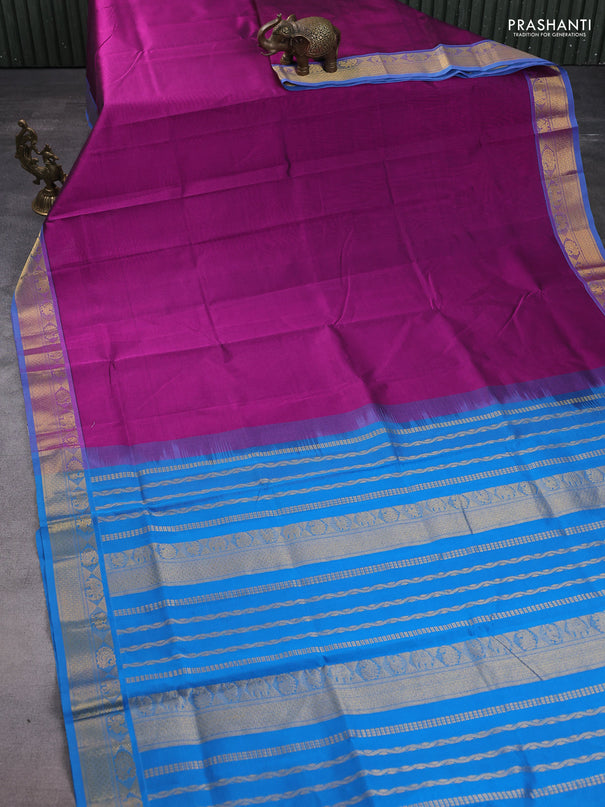 Silk cotton saree purple and cs blue with plain body and zari woven border