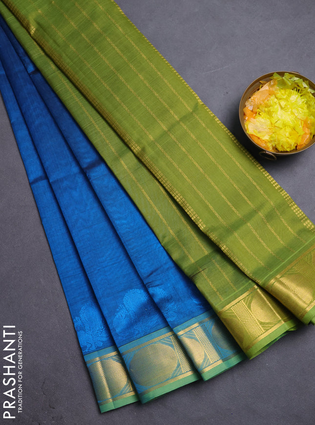 Silk cotton saree peacock blue and mehendi green with plain body and rudhraksha zari woven border