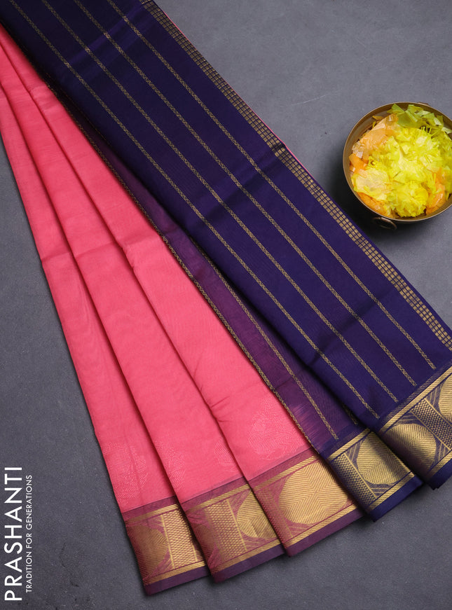 Silk cotton saree peach pink and navy blue with plain body and rudhraksha zari woven border
