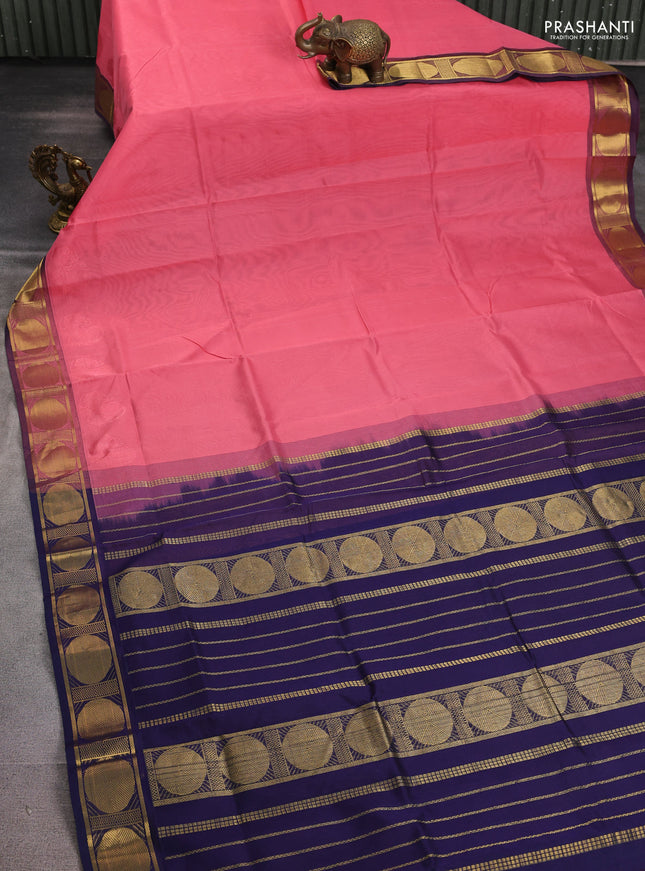 Silk cotton saree peach pink and navy blue with plain body and rudhraksha zari woven border