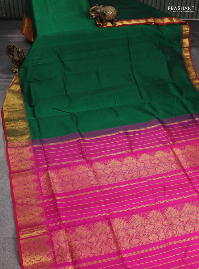 Silk cotton saree green and pink with plain body and zari woven border