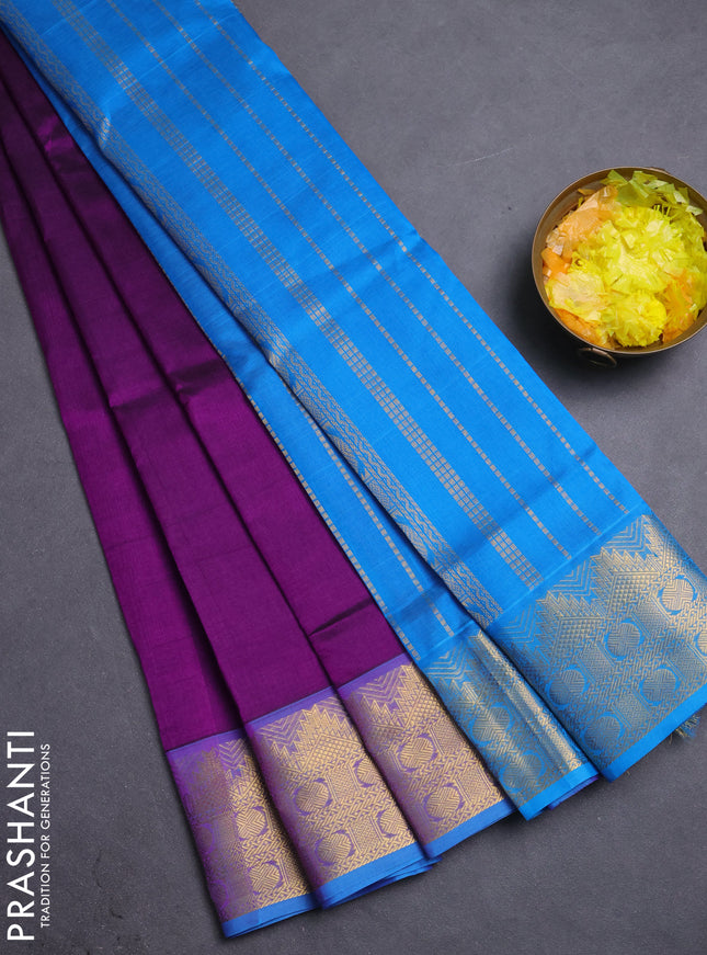 Silk cotton saree purple and cs blue with plain body and zari woven border