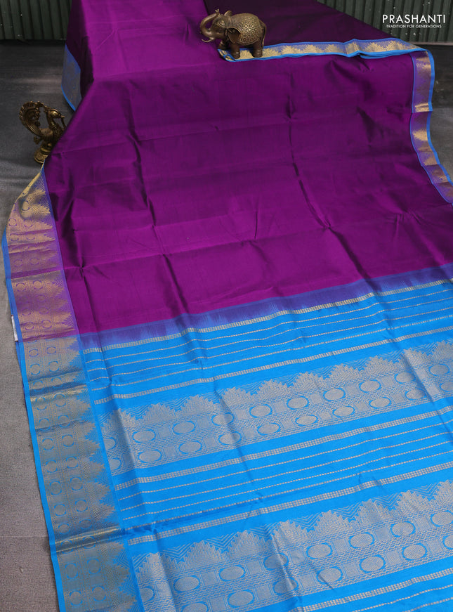 Silk cotton saree purple and cs blue with plain body and zari woven border