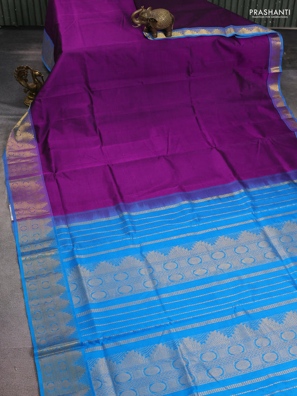 Silk cotton saree purple and cs blue with plain body and zari woven border