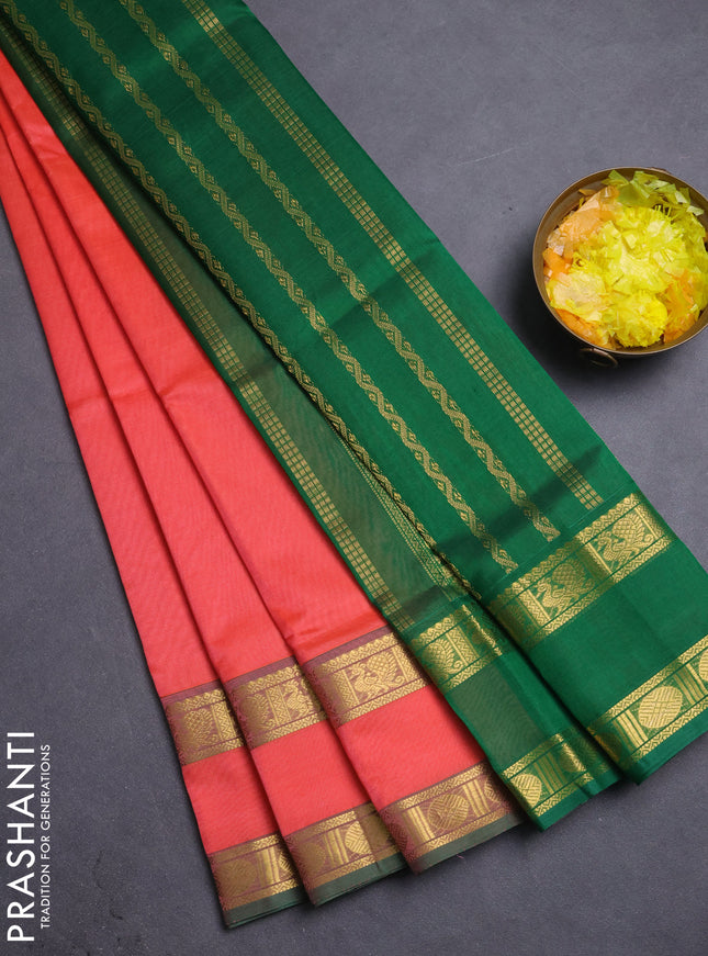 Silk cotton saree dark peach and green with plain body and rettapet zari woven border