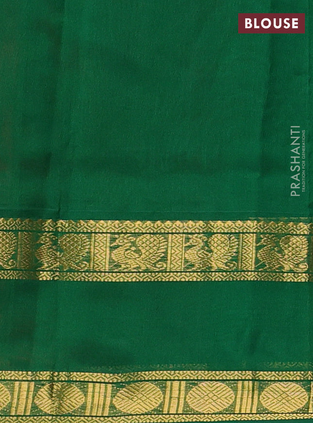 Silk cotton saree dark peach and green with plain body and rettapet zari woven border