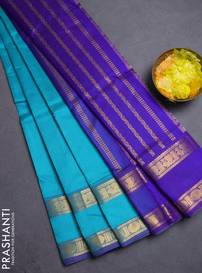 Silk cotton saree teal blue and blue with plain body and rettapet zari woven border