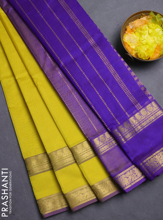 Silk cotton saree lime yellow and blue with plain body and rettapet zari woven border