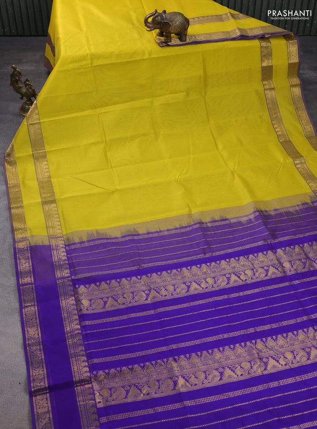 Silk cotton saree lime yellow and blue with plain body and rettapet zari woven border