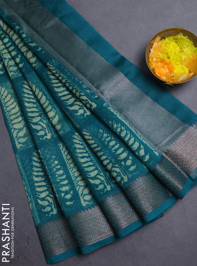 Chanderi silk cotton saree teal green with allover prints and banarasi style border