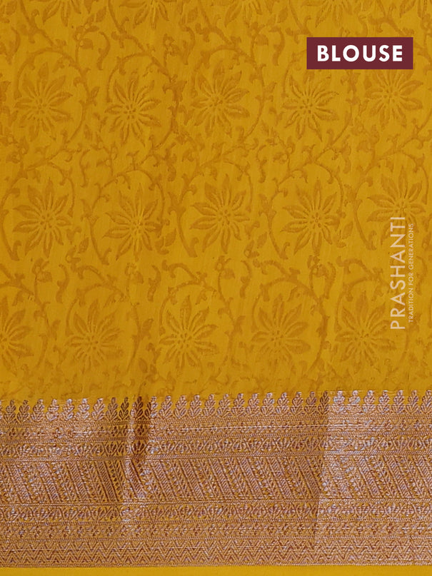 Chanderi silk cotton saree mustard yellow with allover prints and banarasi style border
