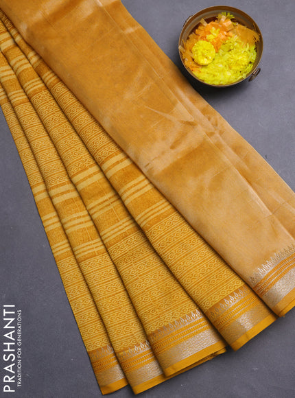 Chanderi silk cotton saree mustard yellow with allover prints and silver zari woven border