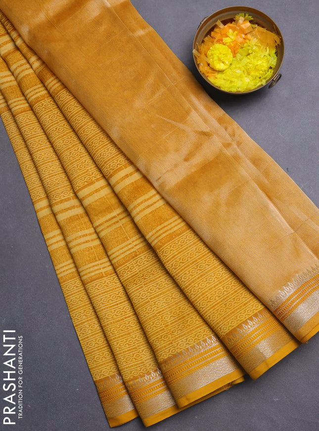 Chanderi silk cotton saree mustard yellow with allover prints and silver zari woven border