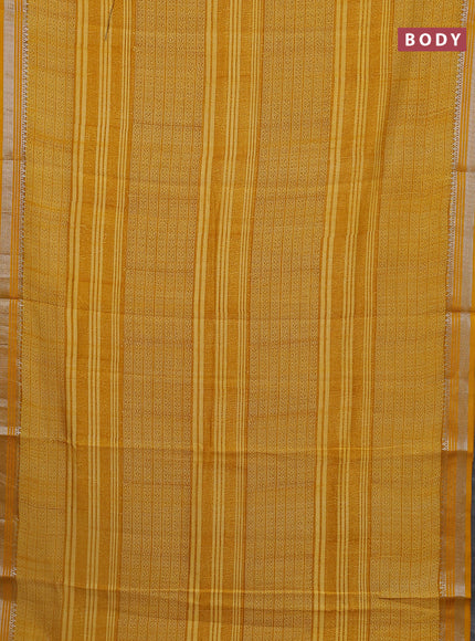 Chanderi silk cotton saree mustard yellow with allover prints and silver zari woven border