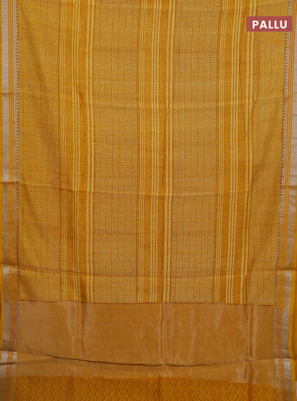 Chanderi silk cotton saree mustard yellow with allover prints and silver zari woven border