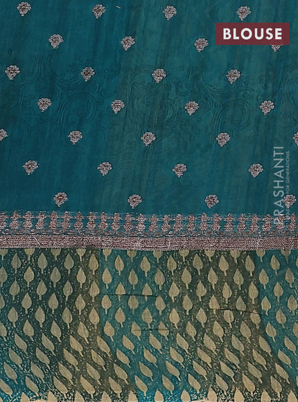 Chanderi silk cotton saree teal green with allover prints & woven buttas and banarasi style border
