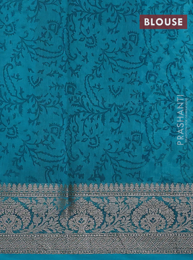 Chanderi silk cotton saree teal green with allover zig zag prints and banarasi style border