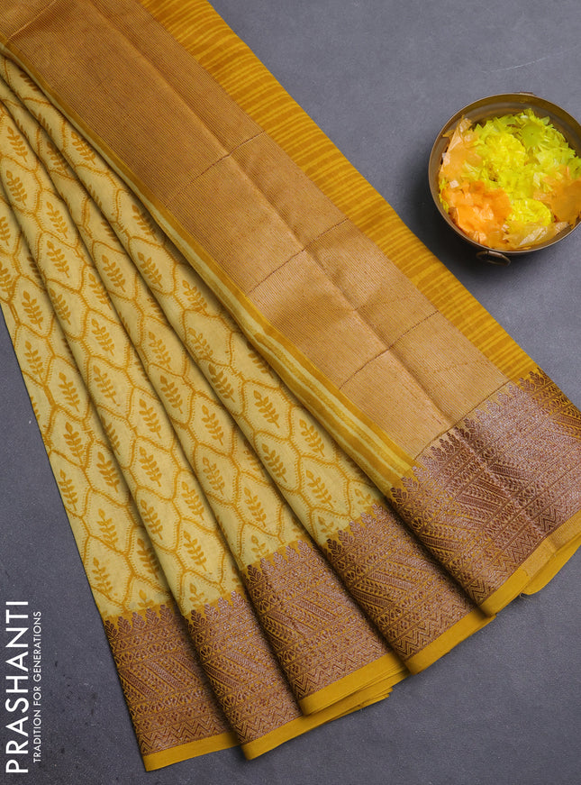 Chanderi silk cotton saree mustard yellow with allover prints and banarasi style border