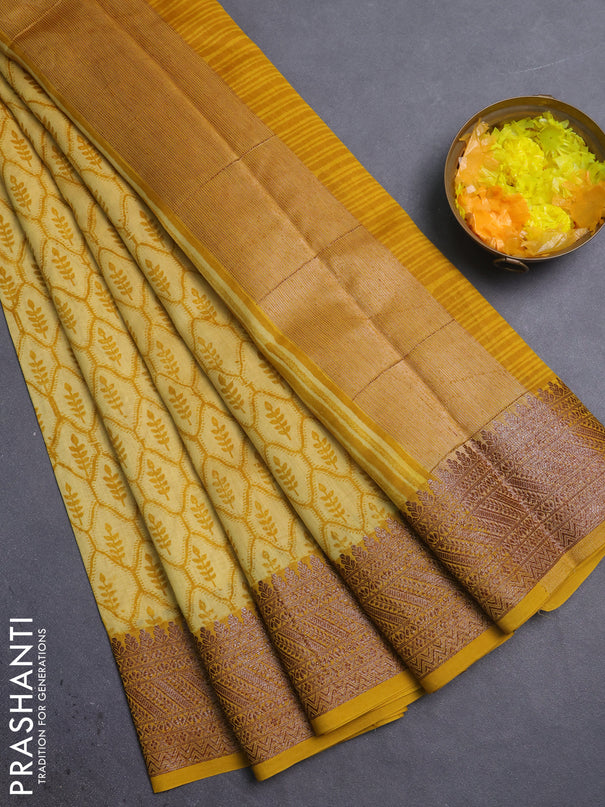 Chanderi silk cotton saree mustard yellow with allover prints and banarasi style border