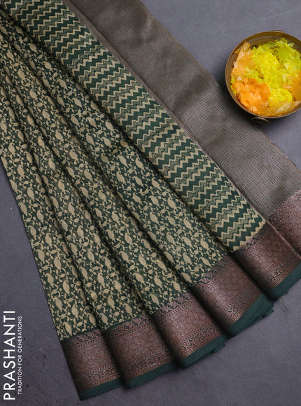 Chanderi silk cotton saree bottle green with allover prints and banarasi style border