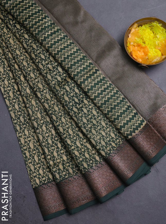 Chanderi silk cotton saree bottle green with allover prints and banarasi style border