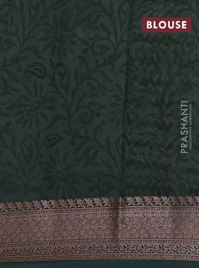 Chanderi silk cotton saree bottle green with allover prints and banarasi style border