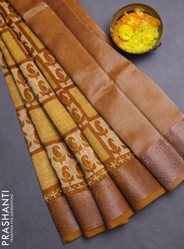 Chanderi silk cotton saree dark mustard with allover paisley butta prints and banarasi style border