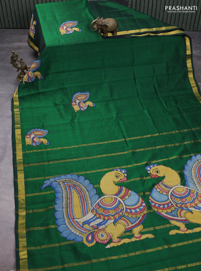 Silk cotton saree bottle green with kalamkari applique work and zari woven border
