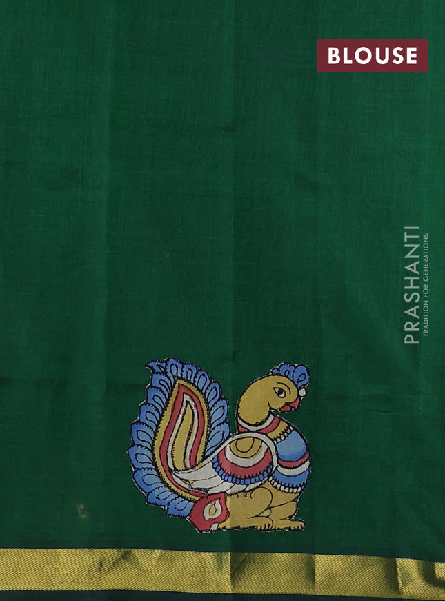 Silk cotton saree bottle green with kalamkari applique work and zari woven border