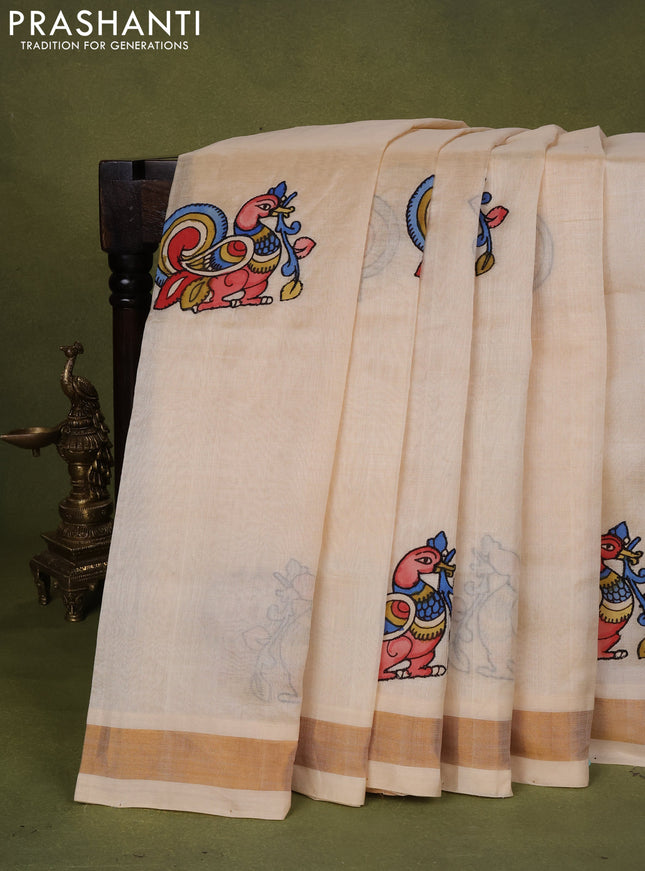 Silk cotton saree beige with kalamkari applique work and zari woven border