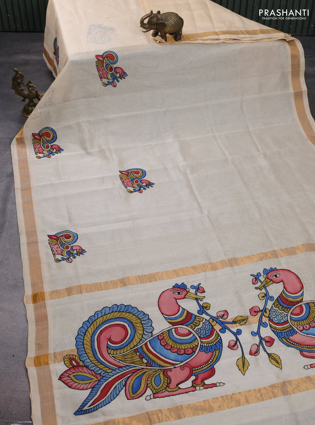 Silk cotton saree beige with kalamkari applique work and zari woven border