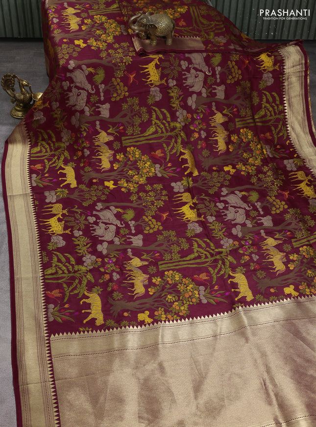 Dola silk saree deep maroon with allover shikarga weaves and zari woven border