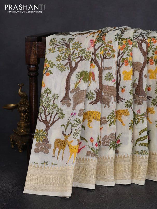 Dola silk saree cream with allover shikarga weaves and zari woven border