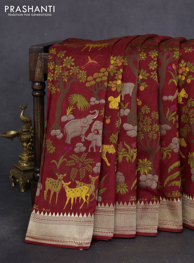 Dola silk saree maroon with allover shikarga weaves and zari woven border